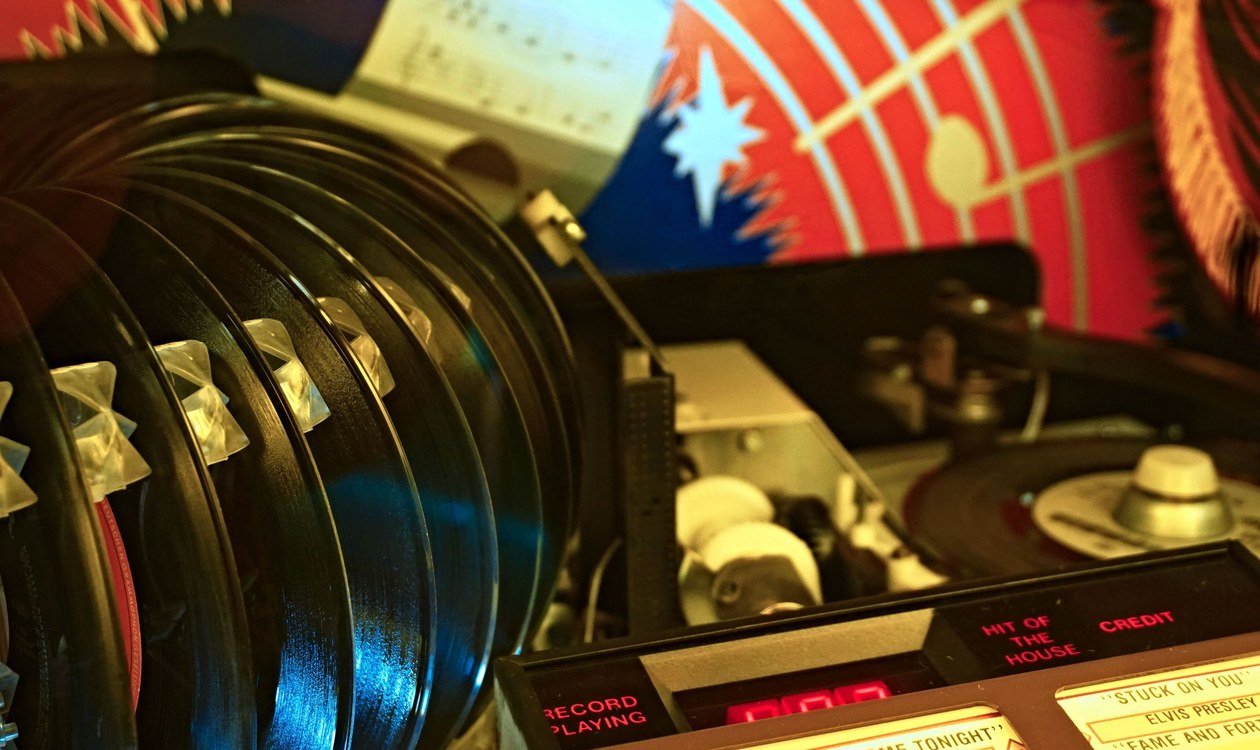 Close-up of a retro jukebox with vinyl records